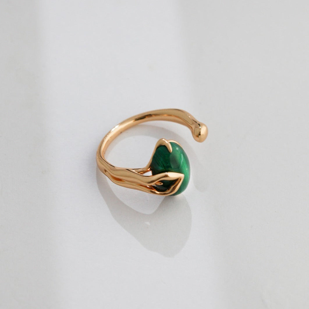 Anillo abierto con piedra de pavo real Ecliptique