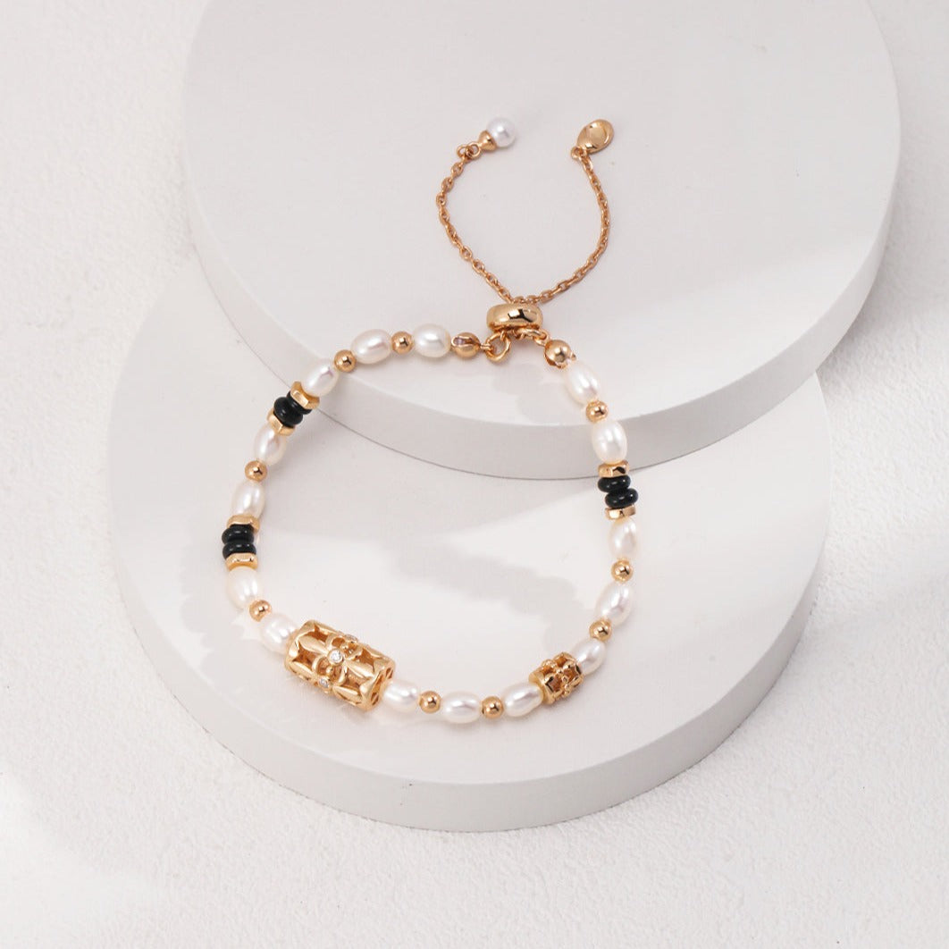 Bracelet de perles d'or et d'agate noire